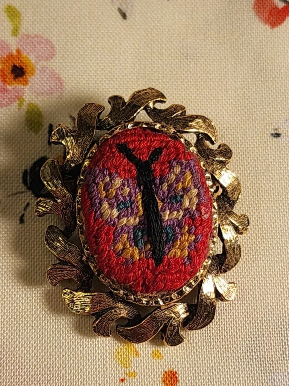 VINTAGE Brooch Featuring Colorful Embroidered Butterfly Set in Gold-Tone Wreath